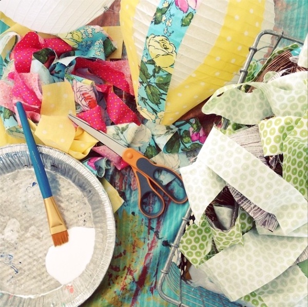 Adding fabric scraps to a DIY hot air balloon