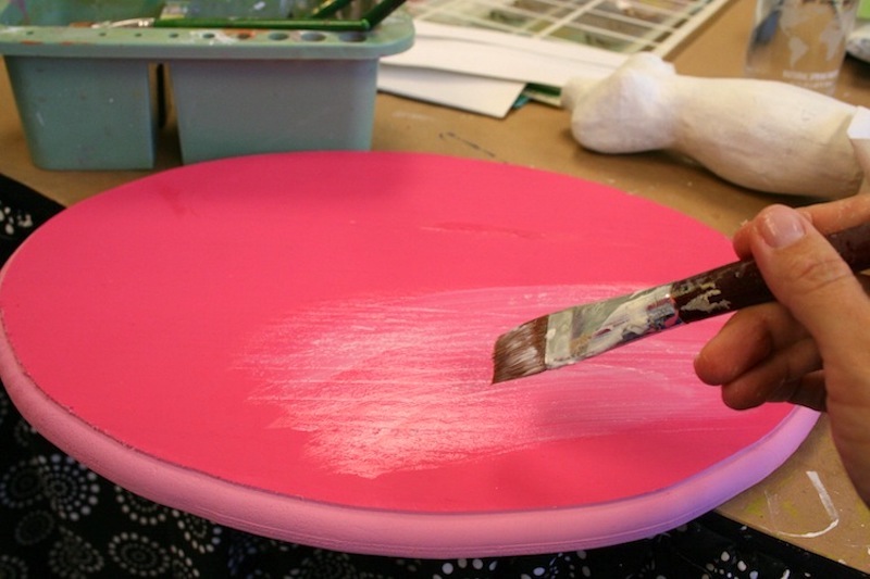Adding Mod Podge to a painted wood plaque