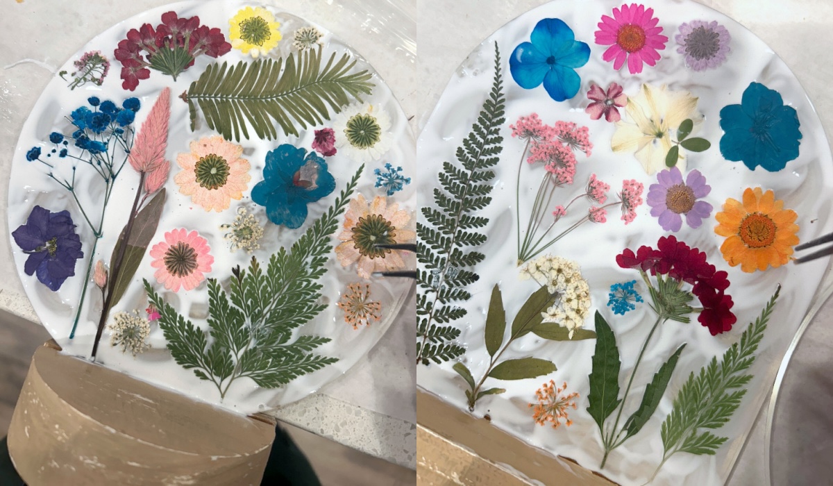 applying dried flowers to the Mod Podged acrylic surface
