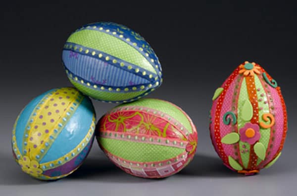 These Styrofoam Easter egg crafts are so easy to make - kids love them too! All you need are Styrofoam eggs, paper, ribbon, and Mod Podge.