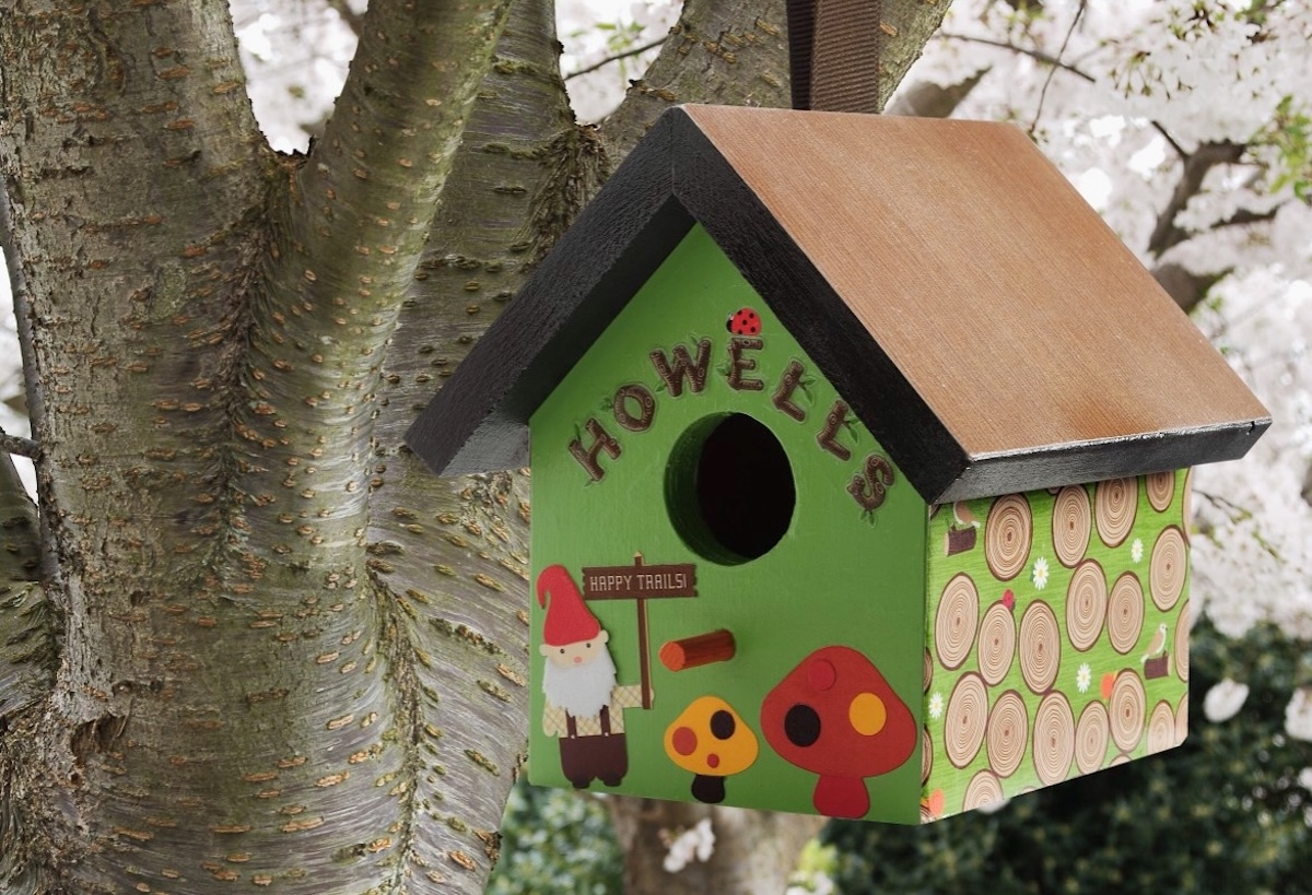 decorate a birdhouse with a gnome theme