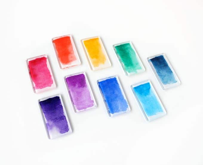 Homemade magnets with acrylic shapes, watercolors, and Mod Podge