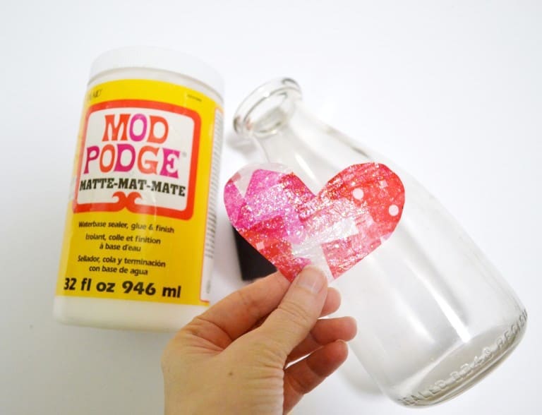 Glass bottle, tissue paper heart, and Mod Podge Matte