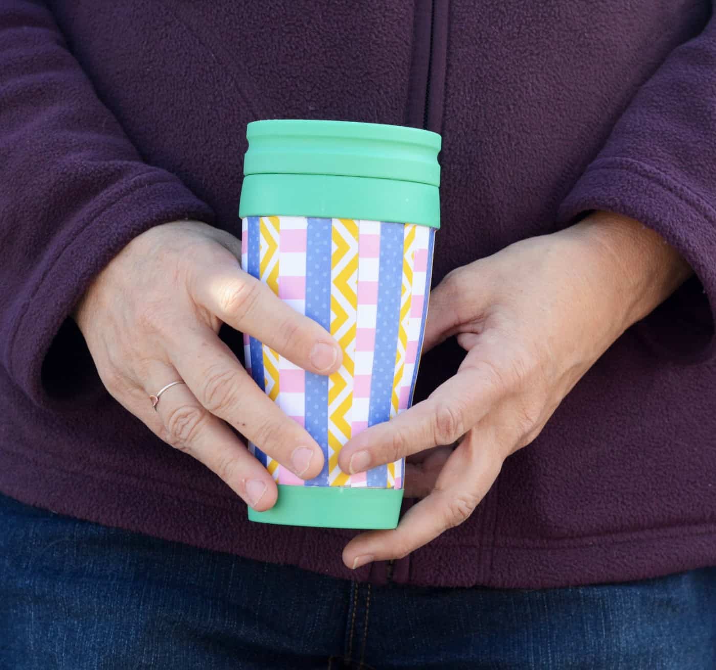 Decorated travel mug