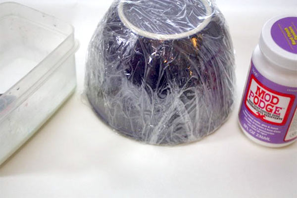 Bowl covered in plastic wrap