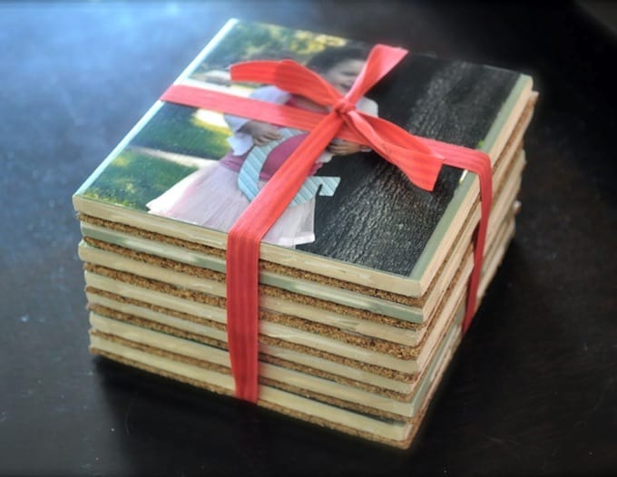 DIY photo coasters stacked and tied with a ribbon