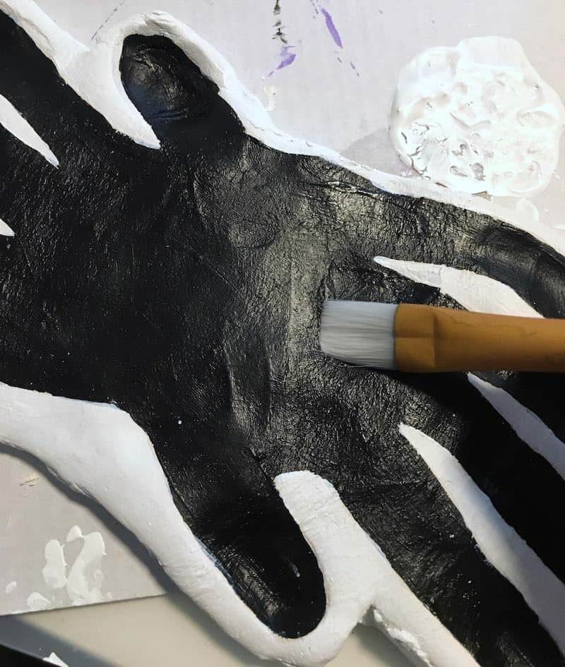 If you're looking for fun and easy Halloween crafts for toddlers, these handprints are perfect! There's a pumpkin, spider, and ghost footprint too.