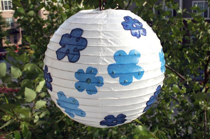 This is yet another great way to DIY your next celebration - decorate a party lantern lantern with glitter and Mod Podge. So easy!