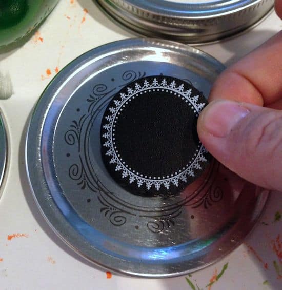 Add a sticker to the top of a mason jar lid