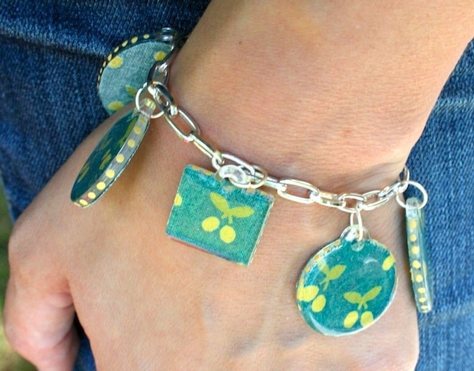 Are you looking for a fun jewelry craft or a unique gift idea? This DIY charm bracelet is made with cute fabric and Dimensional Magic!