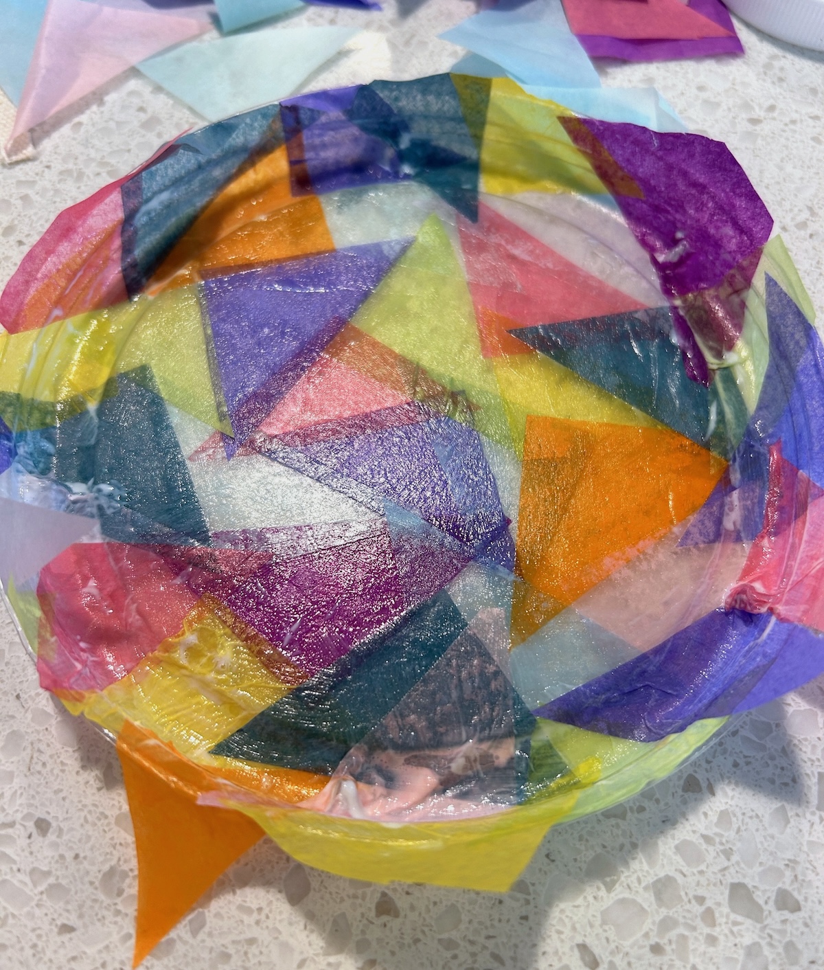 lid and tissue paper drying on the table