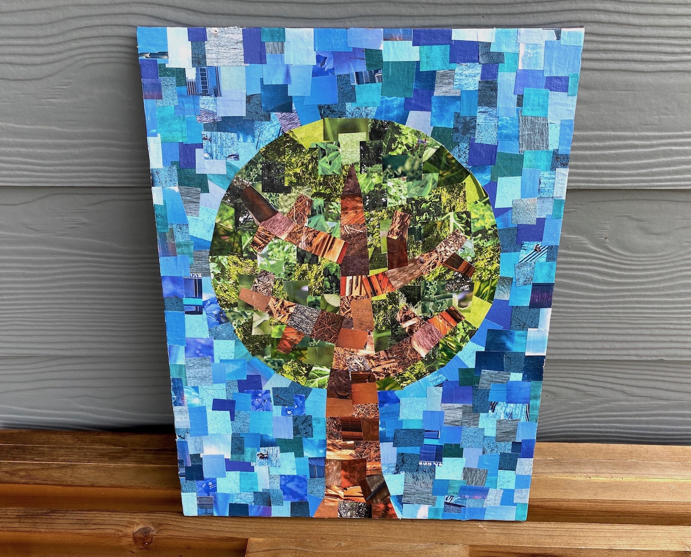 Magazine collage on canvas