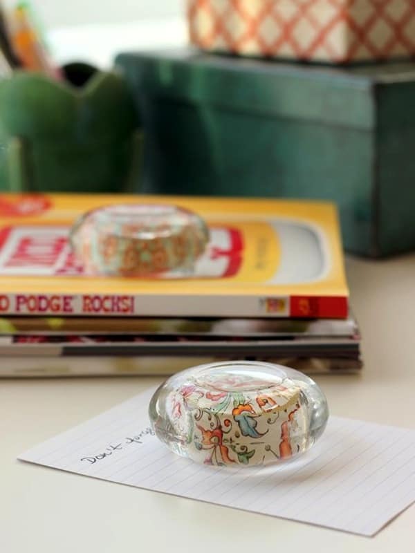 Create gorgeous, customizable DIY paperweights from dollar store glass candle holders! This easy project makes a great gift idea, and you can personalize!