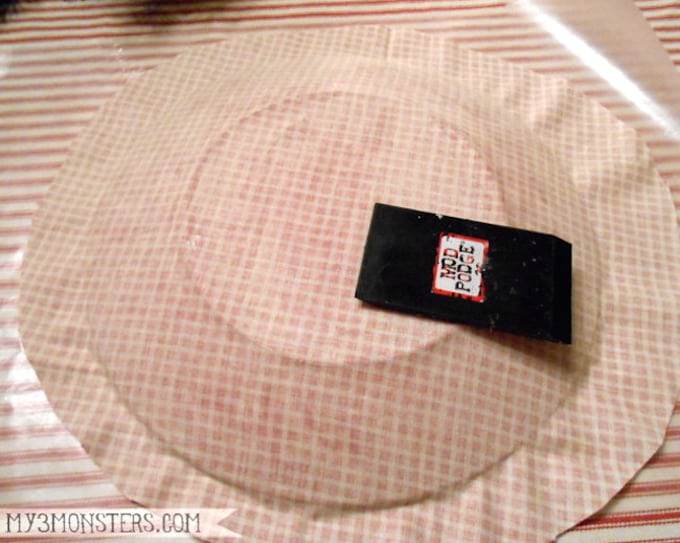 Piece of fabric and a Mod Podge squeegee