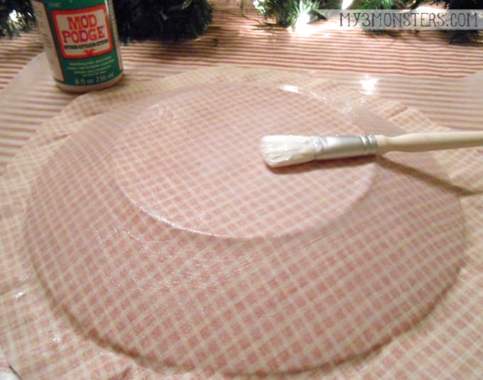 Add Mod Podge to the back of fabric
