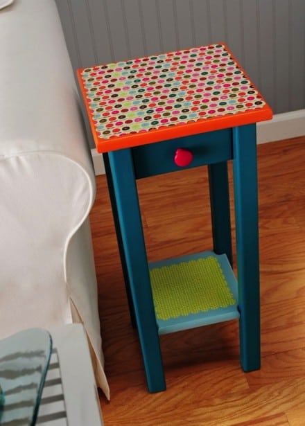 Colorful end table makeover with paint, scrapbook paper, and Mod Podge