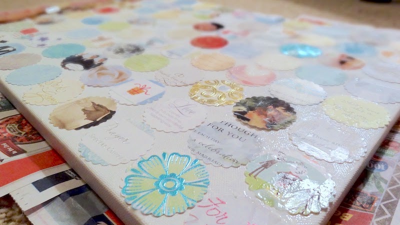 Mod Podge wedding cards to a canvas