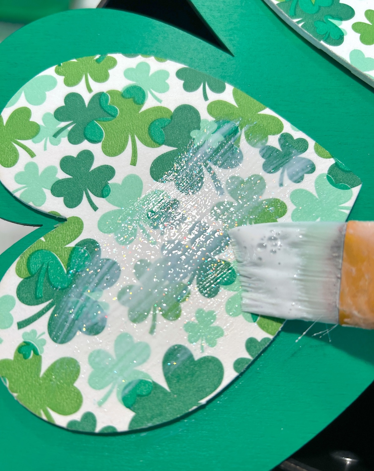 Mod Podging the napkin with Sparkle Mod Podge