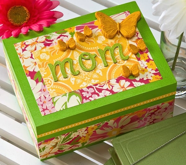 Decorate this DIY jewelry box with your favorite papers and Mod Podge; it makes the perfect mothers day craft for the mom who has everything!