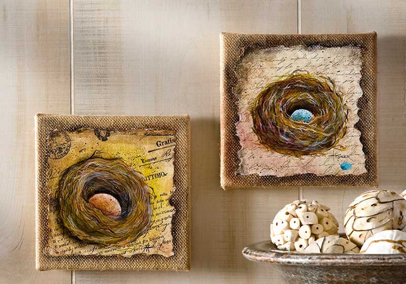 Painted birds nest on a Mod Podge background