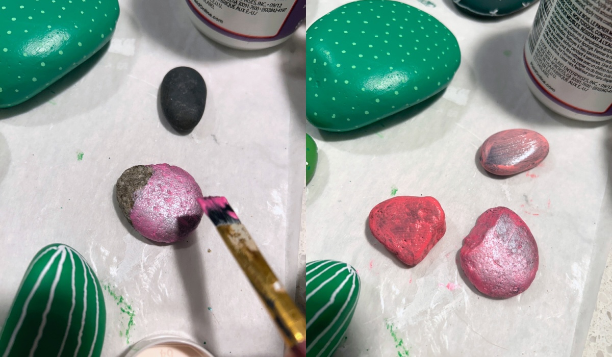 painting the smaller rocks with pink paint