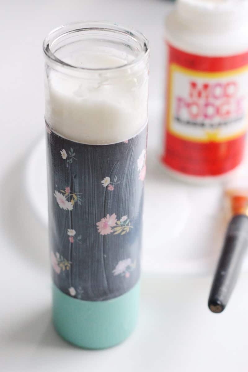 These paper-wrapped and paint-dipped candles use the power of Mod Podge to bring some springy life to some boring, dollar store candles.
