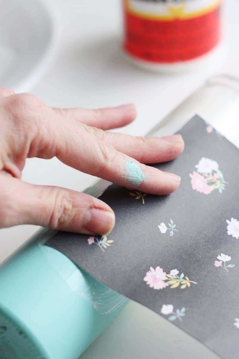 These paper-wrapped and paint-dipped candles use the power of Mod Podge to bring some springy life to some boring, dollar store candles.