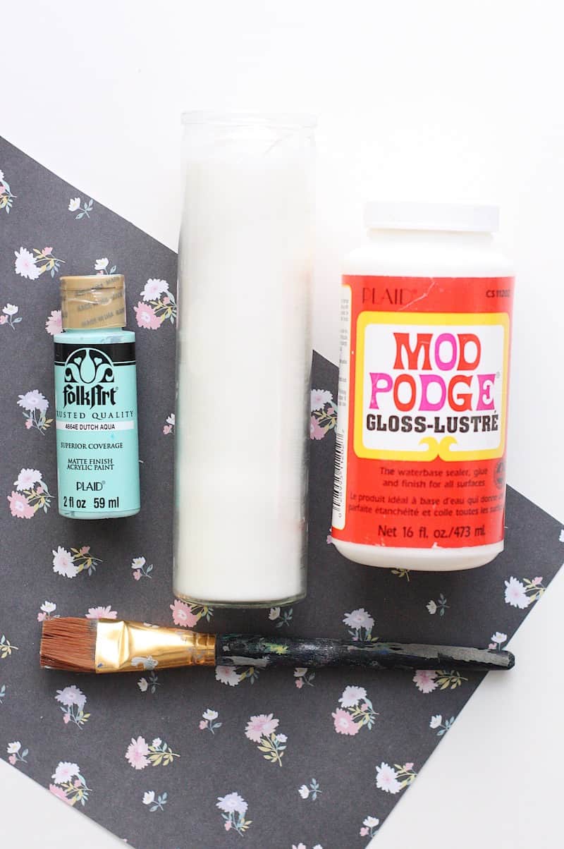 These paper-wrapped and paint-dipped candles use the power of Mod Podge to bring some springy life to some boring, dollar store candles.