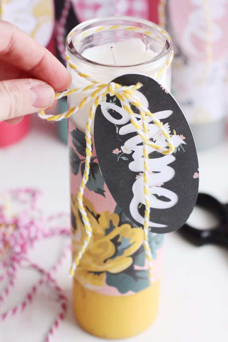 These paper-wrapped and paint-dipped candles use the power of Mod Podge to bring some springy life to some boring, dollar store candles.