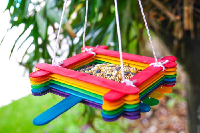 rainbow popsicle stick bird feeder