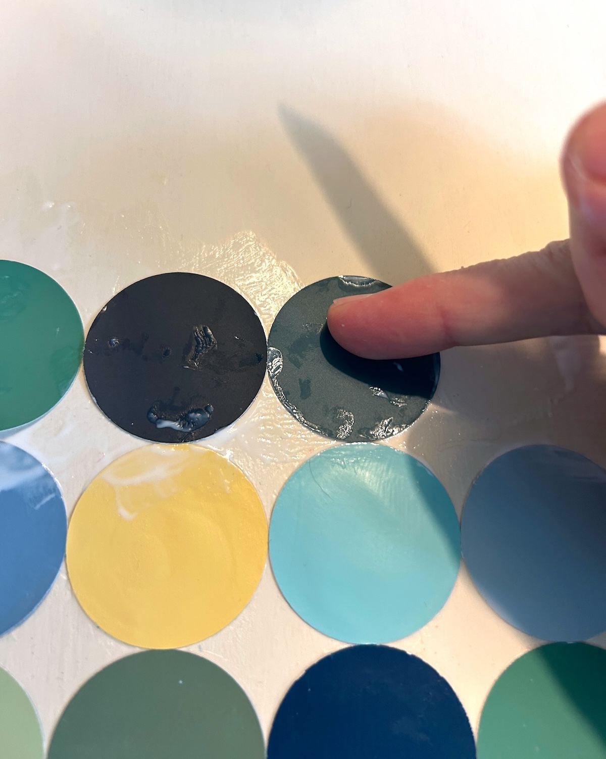smoothing a chip down with a finger