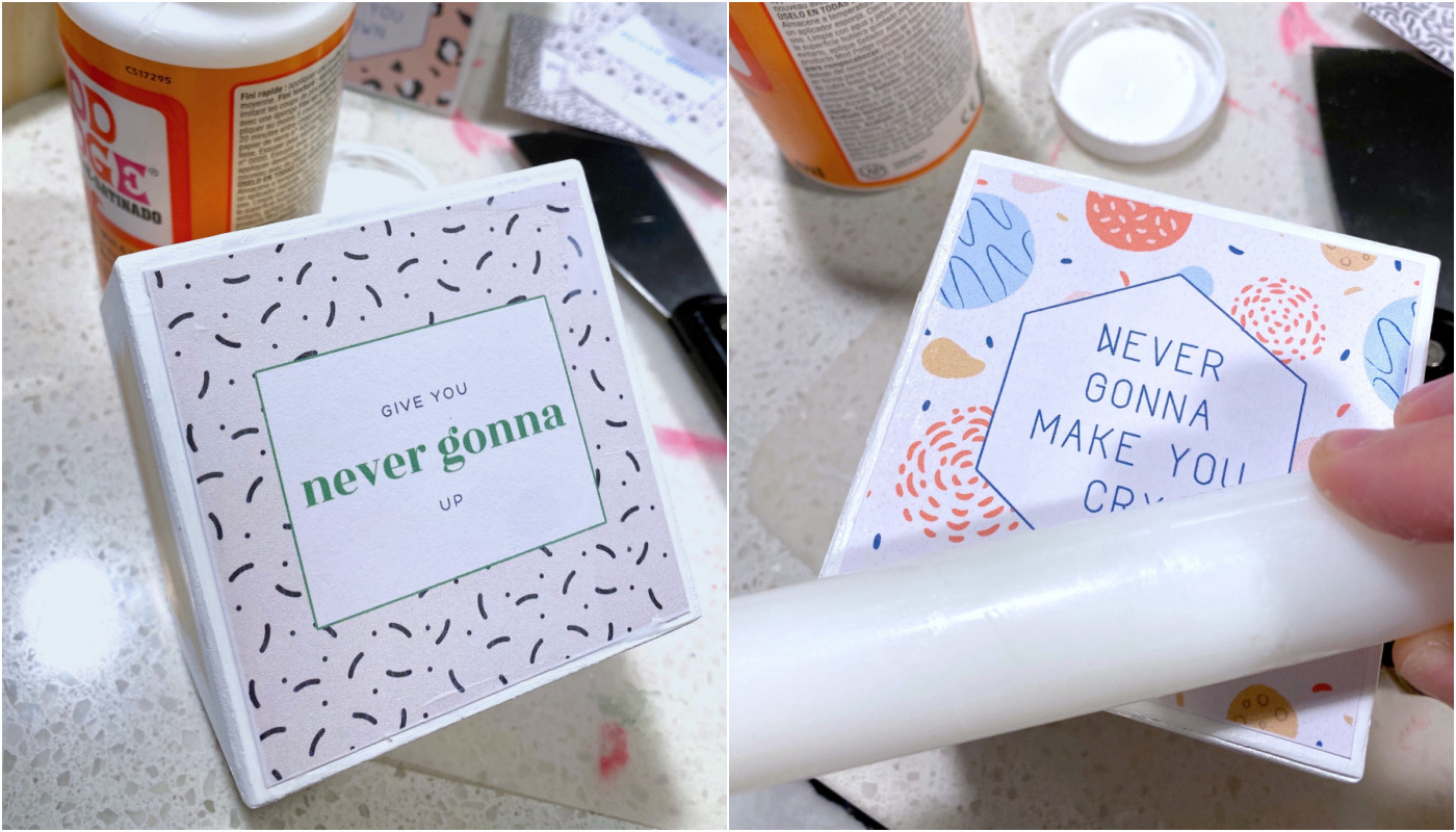 Smoothing down the paper with a roller