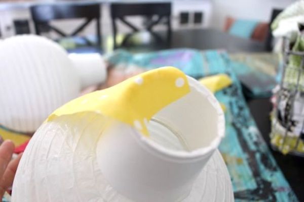 Strip of fabric glued to the bottom inside of the cup