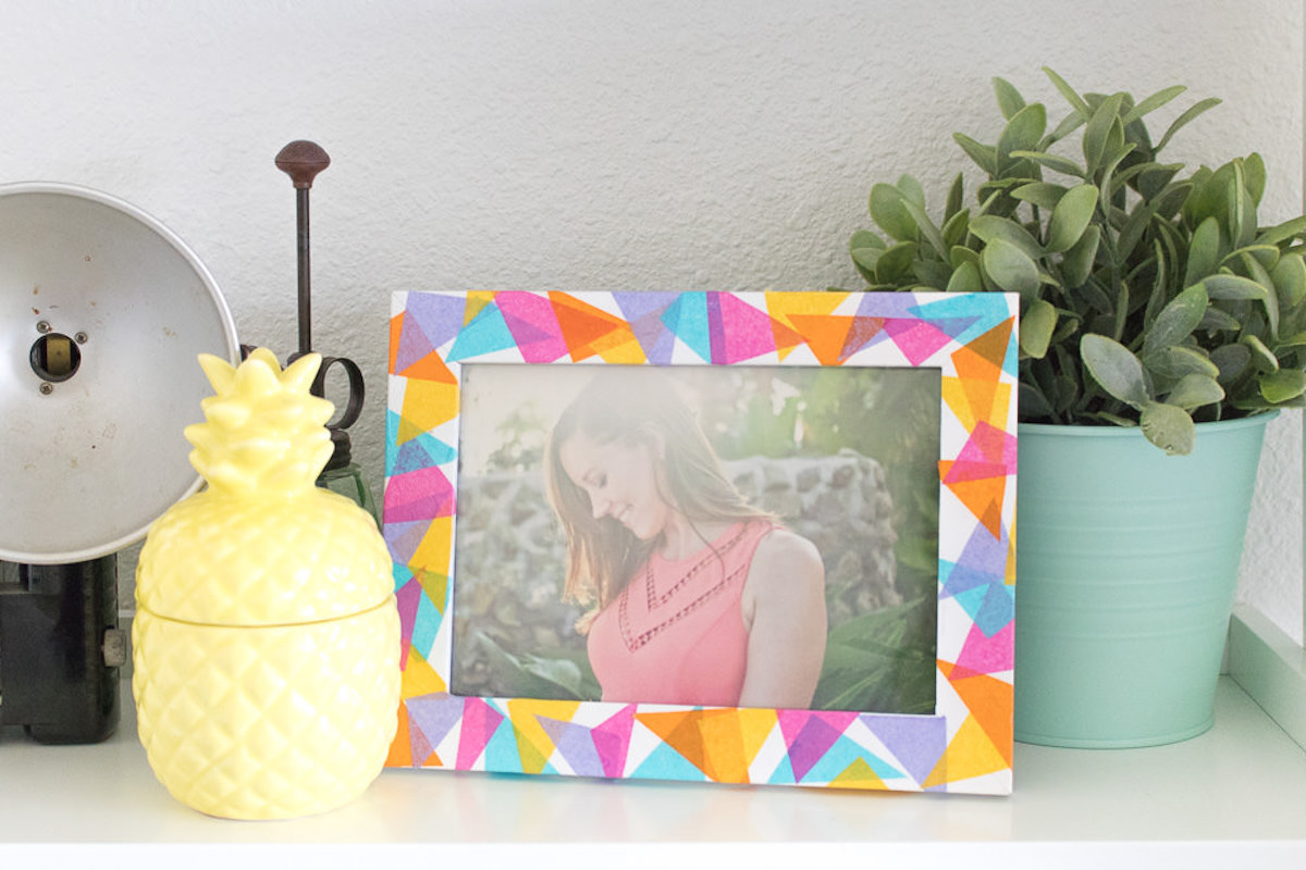 tissue paper and mod podge on a frame