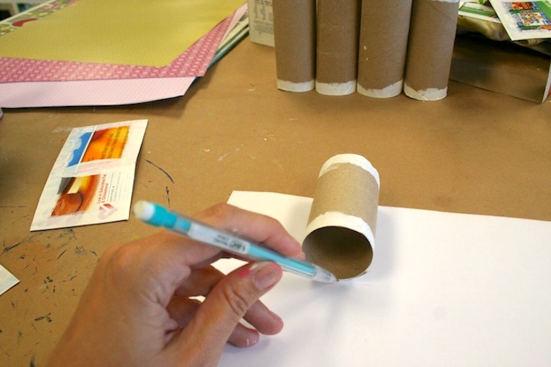 Tracing toilet paper rolls on paper