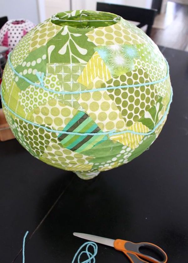 Two loops of yarn sitting on a DIY hot air balloon